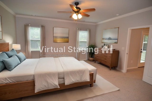 bedroom featuring crown molding, light colored carpet, and ceiling fan