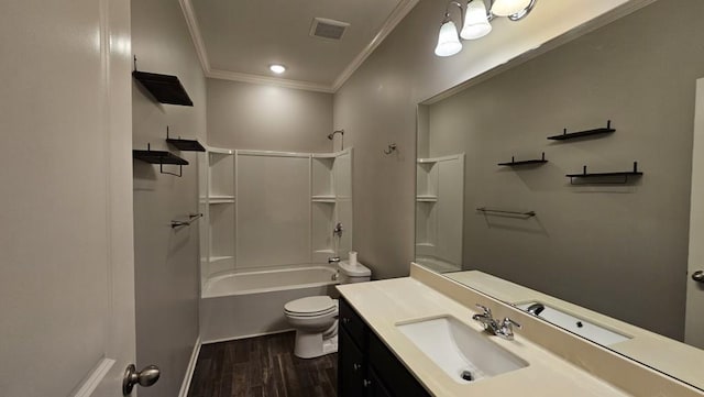 full bathroom featuring hardwood / wood-style flooring,  shower combination, vanity, ornamental molding, and toilet