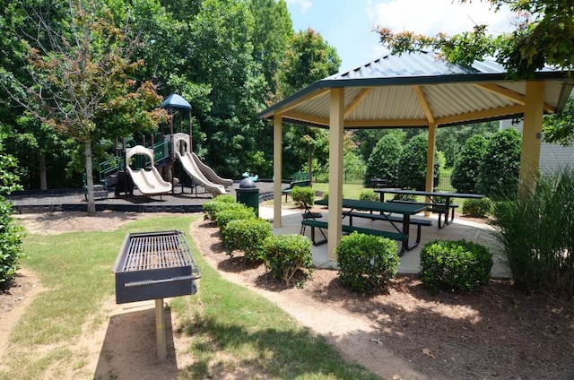 view of property's community with a gazebo, a lawn, and a playground