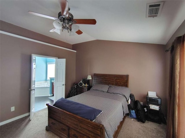 bedroom featuring visible vents, carpet floors, baseboards, a ceiling fan, and vaulted ceiling
