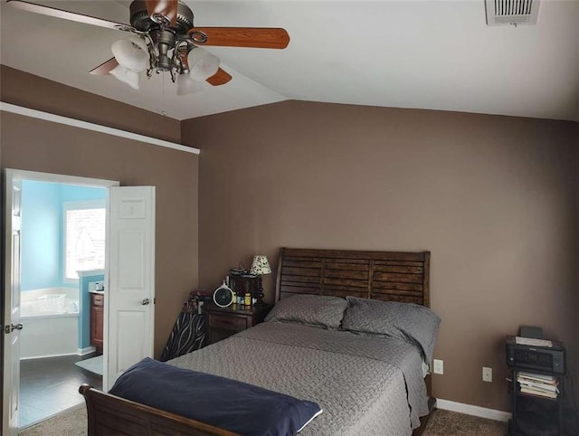 bedroom featuring visible vents, baseboards, ceiling fan, and vaulted ceiling