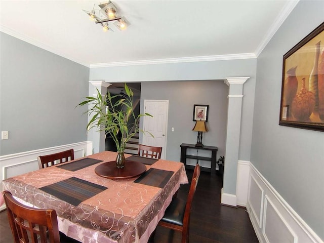 dining space featuring crown molding and dark wood-style flooring