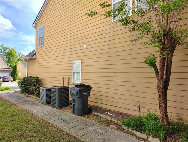 view of property exterior with central air condition unit
