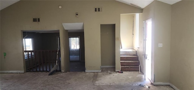 foyer with lofted ceiling