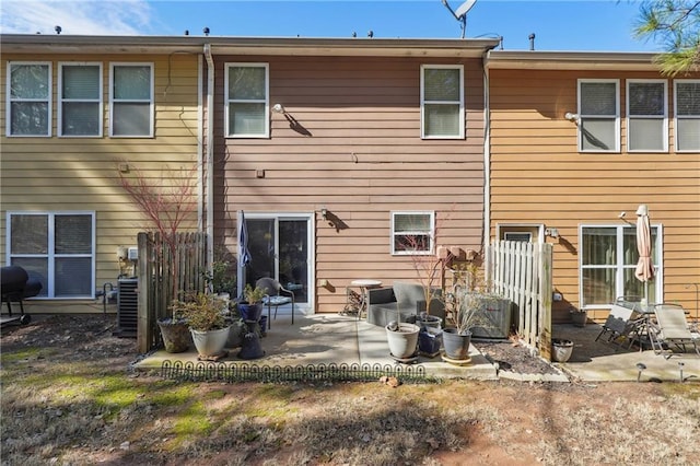 back of house with a patio area