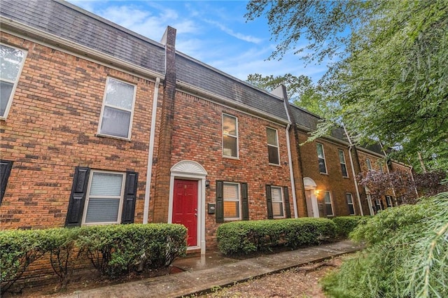 115 Winding River Dr Unit B, Atlanta, GA 30350 - townhome / multi-family property with brick siding and mansard roof