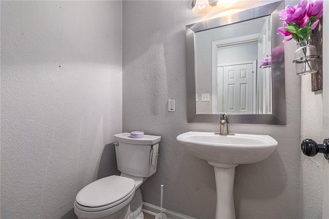 115 Winding River Dr Unit B, Atlanta, GA 30350 - bathroom featuring toilet