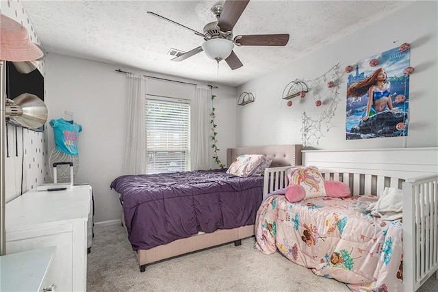 115 Winding River Dr Unit B, Atlanta, GA 30350 - bedroom featuring a textured ceiling, carpet floors, and a ceiling fan