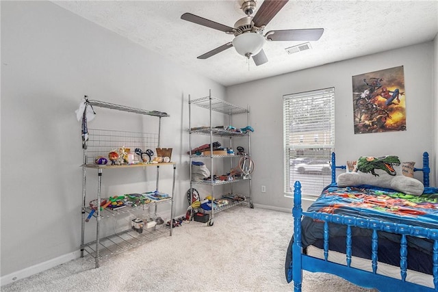 115 Winding River Dr Unit B, Atlanta, GA 30350 - carpeted bedroom with a textured ceiling and a ceiling fan