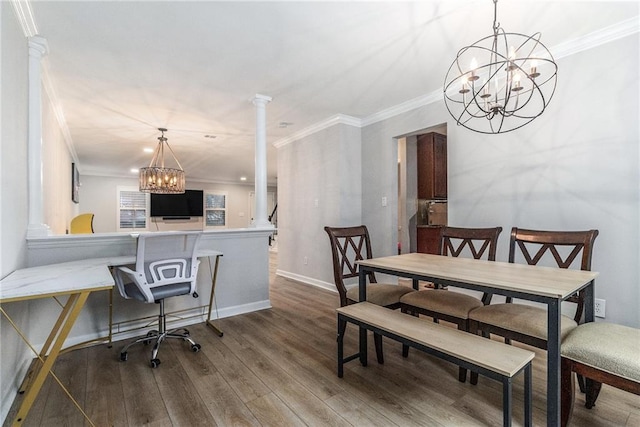 115 Winding River Dr Unit B, Atlanta, GA 30350 - dining room featuring a chandelier, decorative columns, crown molding, and wood finished floors