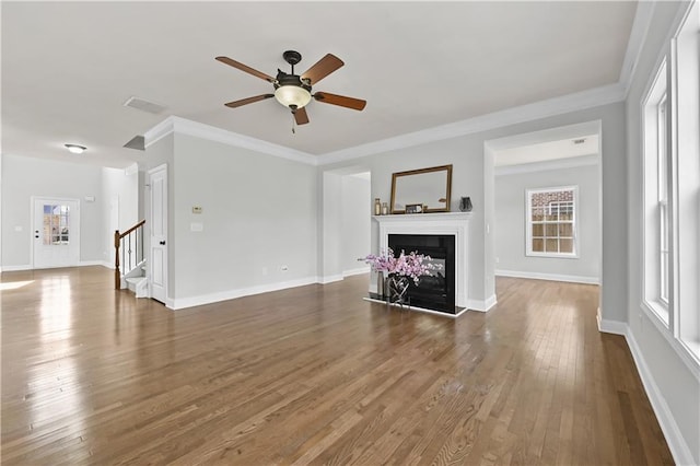 120 Daniel Creek Ln, Sugar Hill, GA 30518 - unfurnished living room featuring stairs, ceiling fan, wood finished floors, ornamental molding, and a fireplace