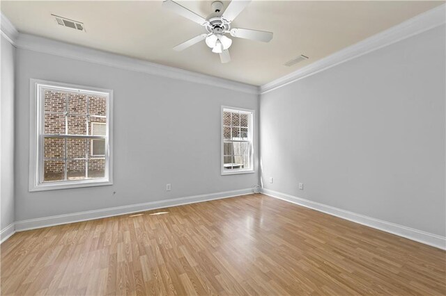 120 Daniel Creek Ln, Sugar Hill, GA 30518 - spare room with crown molding, light wood-style floors, and a ceiling fan