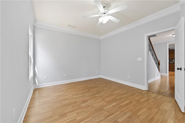 120 Daniel Creek Ln, Sugar Hill, GA 30518 - empty room featuring light wood-style floors, crown molding, ceiling fan, and stairs