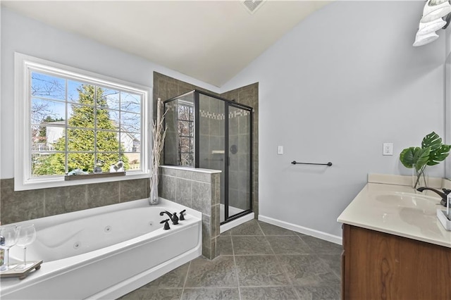 120 Daniel Creek Ln, Sugar Hill, GA 30518 - full bathroom featuring double vanity, a tub with jets, a shower stall, lofted ceiling, and tile patterned flooring