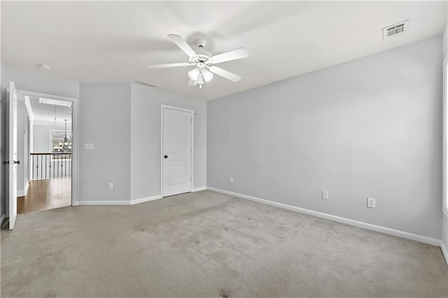 120 Daniel Creek Ln, Sugar Hill, GA 30518 - unfurnished bedroom with attic access, carpet, and ceiling fan