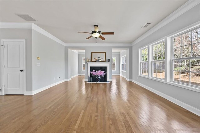 120 Daniel Creek Ln, Sugar Hill, GA 30518 - unfurnished living room with ceiling fan, hardwood / wood-style flooring, ornamental molding, and a fireplace