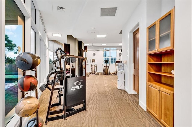 2881 Peachtree Rd NE Unit 1202, Atlanta, GA 30305 - gym featuring baseboards and light carpet