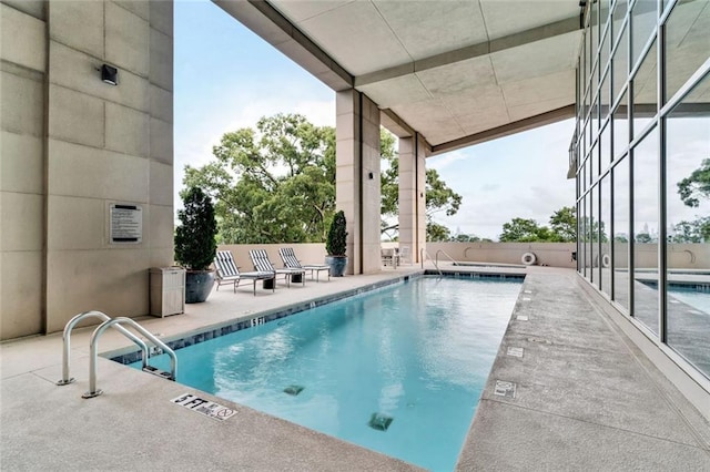 2881 Peachtree Rd NE Unit 1202, Atlanta, GA 30305 - community pool with a patio