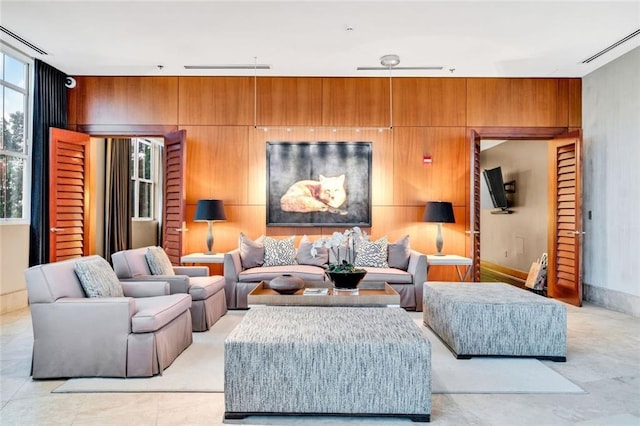 2881 Peachtree Rd NE Unit 1202, Atlanta, GA 30305 - living area featuring wooden walls and baseboards