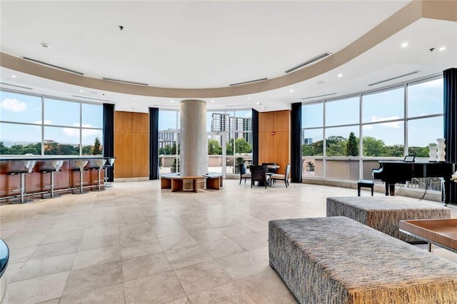 2881 Peachtree Rd NE Unit 1202, Atlanta, GA 30305 - building lobby featuring floor to ceiling windows and recessed lighting