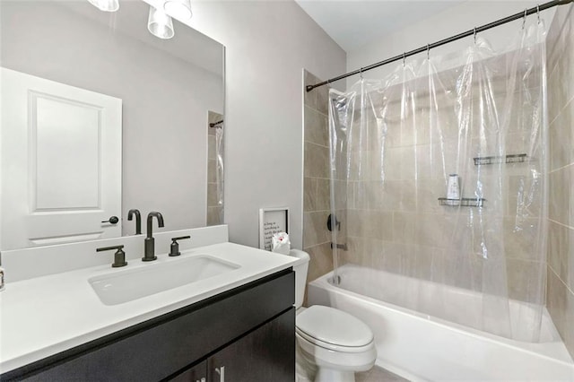 full bathroom with vanity, shower / bathtub combination with curtain, and toilet