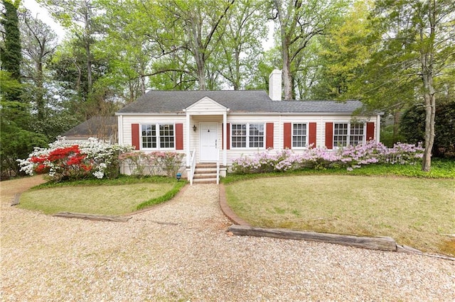 70 Mount Paran Rd NE, Atlanta, GA 30342 - view of front facade with a chimney and a front yard