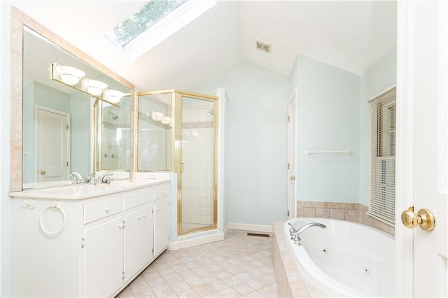 70 Mount Paran Rd NE, Atlanta, GA 30342 - bathroom with a skylight, a stall shower, a tub with jets, vaulted ceiling, and vanity