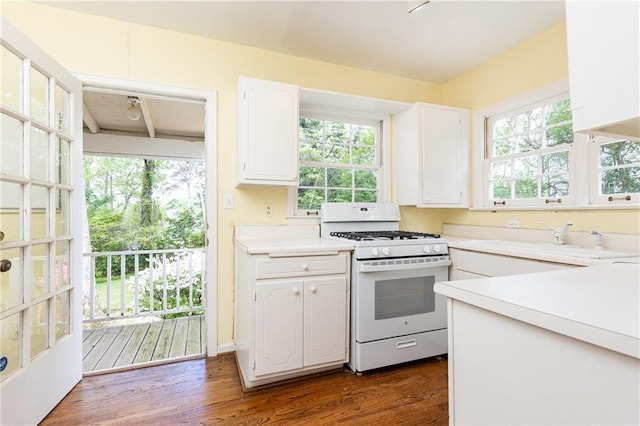 70 Mount Paran Rd NE, Atlanta, GA 30342 - kitchen with white range with gas cooktop, white cabinetry, a sink, and light countertops