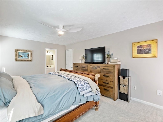 2466 Thrasher Rd, Buford, GA 30519 - bedroom featuring light colored carpet, baseboards, ensuite bathroom, and a ceiling fan