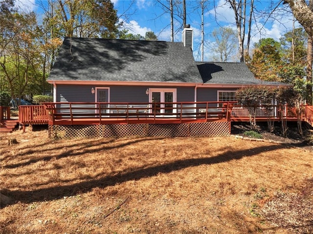 2466 Thrasher Rd, Buford, GA 30519 - back of property with a shingled roof, a wooden deck, and a chimney