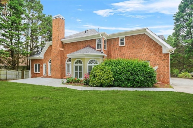 110 Glen Eagle Way, Mcdonough, GA 30253 - back of house featuring a chimney and brick siding