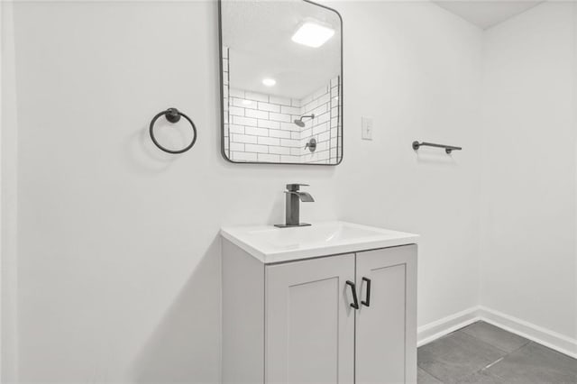 110 Glen Eagle Way, Mcdonough, GA 30253 - bathroom featuring vanity, baseboards, and tile patterned floors