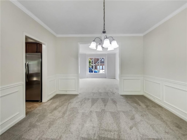 unfurnished room with crown molding, a chandelier, and light carpet