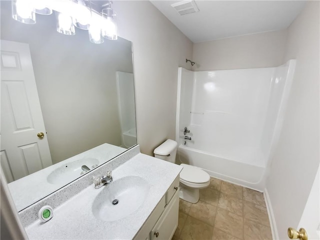 full bathroom featuring toilet, bathing tub / shower combination, and vanity