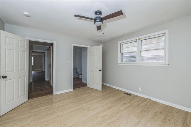 unfurnished bedroom with ceiling fan and light hardwood / wood-style flooring