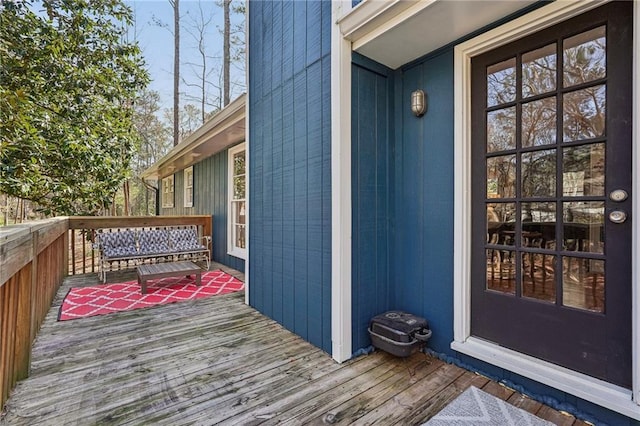 entrance to property featuring a deck