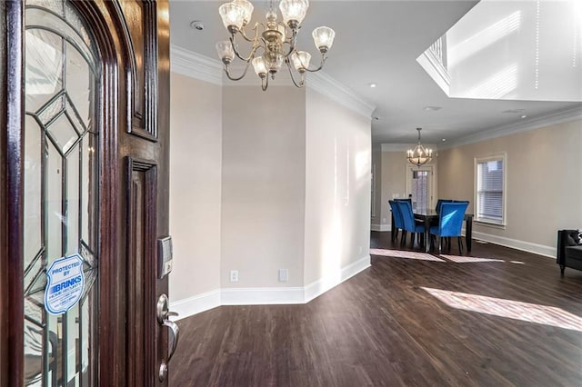 dining room featuring ornamental molding, dark wood-type flooring, and a chandelier