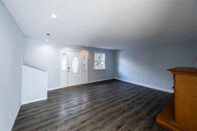 5479 Dorsett Shoals Rd, Douglasville, GA 30135 - foyer entrance featuring dark wood-style flooring, baseboards, and recessed lighting