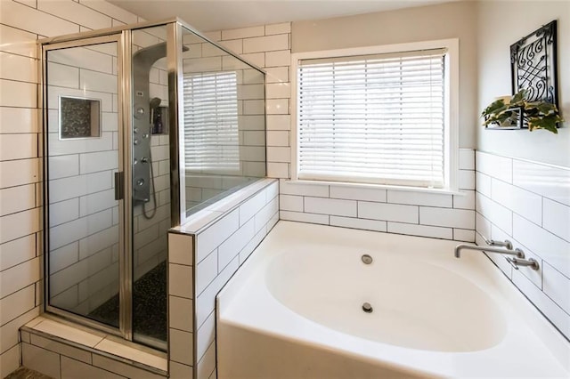 5479 Dorsett Shoals Rd, Douglasville, GA 30135 - full bathroom with a garden tub and a shower stall