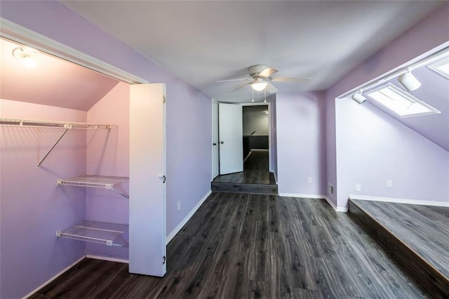 5479 Dorsett Shoals Rd, Douglasville, GA 30135 - additional living space with wood finished floors, baseboards, ceiling fan, a skylight, and lofted ceiling