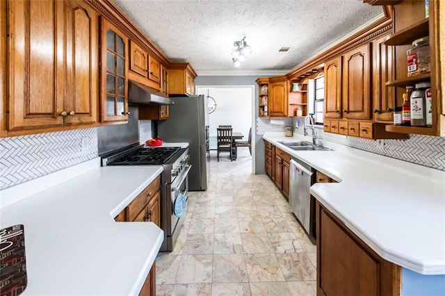 5479 Dorsett Shoals Rd, Douglasville, GA 30135 - kitchen with open shelves, stainless steel appliances, under cabinet range hood, a sink, and brown cabinetry