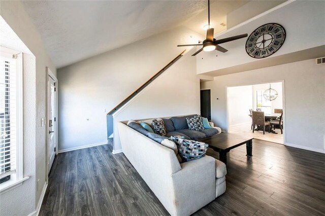 5479 Dorsett Shoals Rd, Douglasville, GA 30135 - living area featuring lofted ceiling, wood finished floors, a ceiling fan, and baseboards
