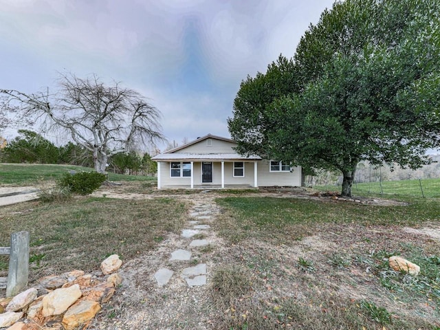 view of front of home with a front yard