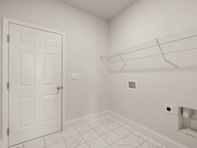 laundry room featuring hookup for a washing machine, hookup for an electric dryer, baseboards, and laundry area