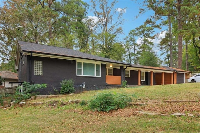 ranch-style house with a front yard