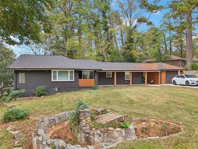 single story home with a front lawn and a garage