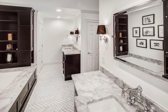 bathroom featuring vanity and crown molding