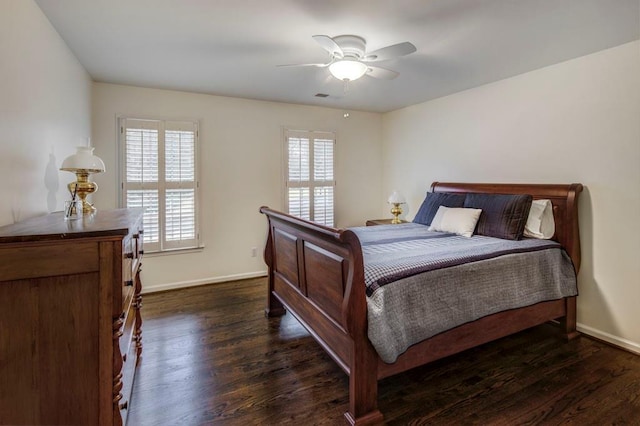 bedroom featuring dark hardwood / wood-style floors and ceiling fan