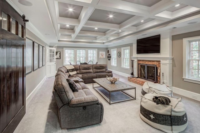 living room with beamed ceiling, light colored carpet, coffered ceiling, and a fireplace