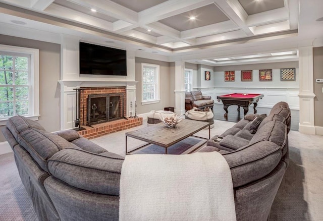 living room featuring coffered ceiling, a fireplace, light colored carpet, and beamed ceiling